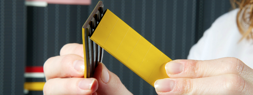 Magnetic text plates 'snap' to length in 10mm increments